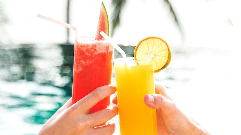 Toasting Glasses With Juice Wallpaper Toasting Glasses With Juice Wallpaper