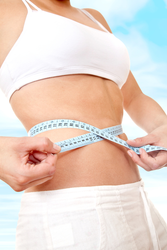 fit female measuring her waist fit female measuring her waist