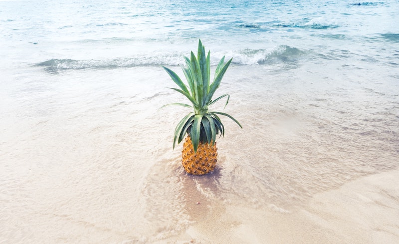 pineapple on beach pineapple on beach